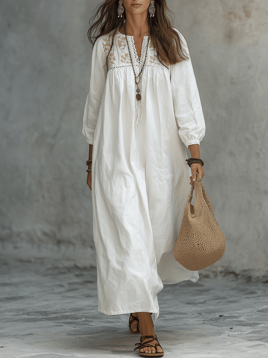 Vestido Maxi Blanco Bohemio con Bordado Floral y Mangas de Globo